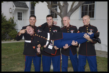 Groomsmen Holding Groom